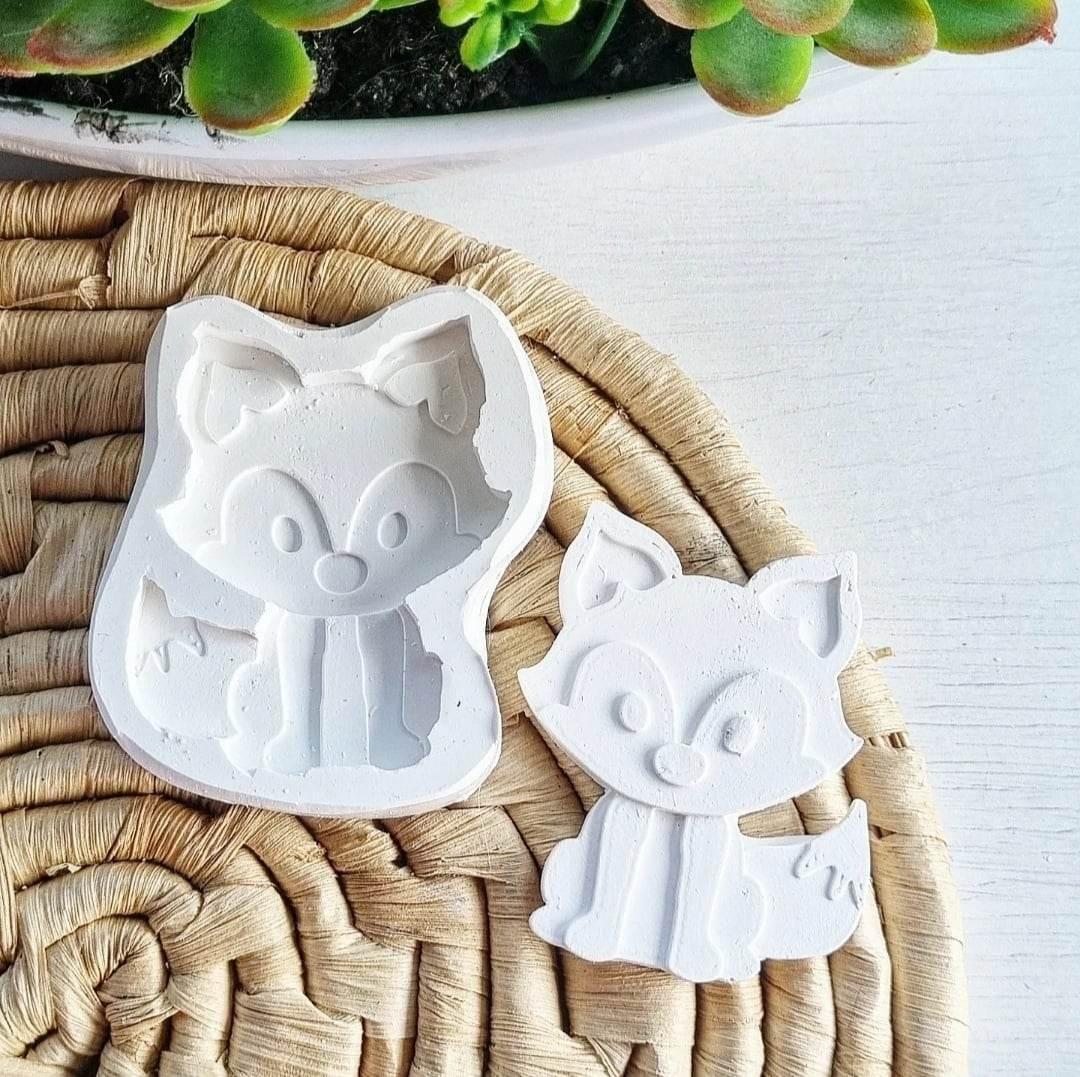 Molde em silicone branco com duas figuras de raposa do Pequeno Príncipe
