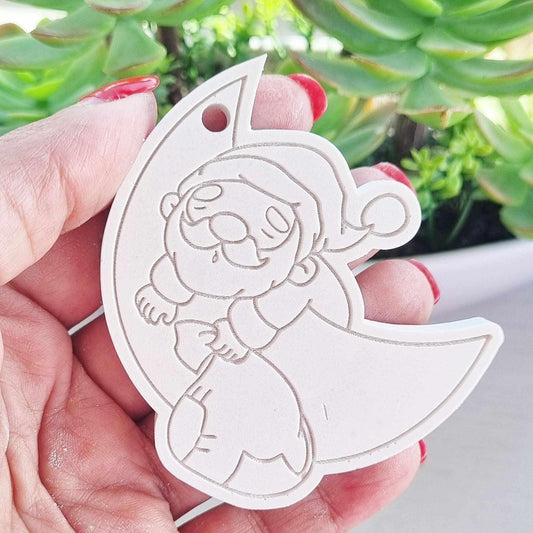 Molde oval branco com relevo do Pai Natal no contorno da lua