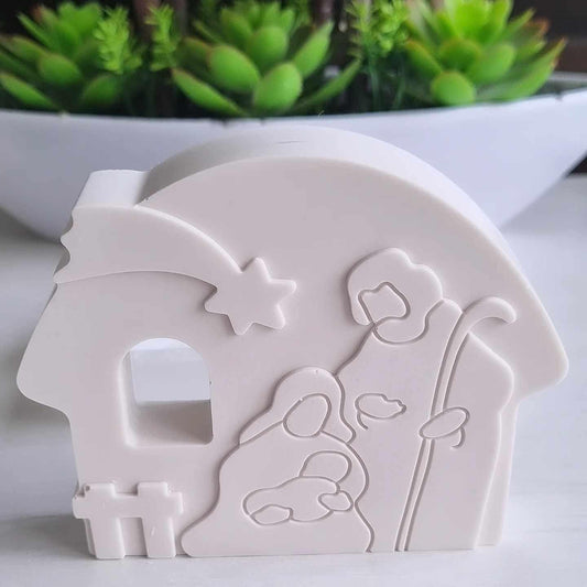 Molde de presépio em relevo branco, com figuras e estrela recortadas