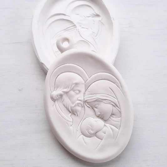 Molde oval para presépio em relevo, com figuras de Natal esculpidas