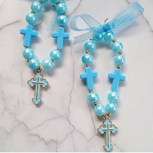 Terço-dezena azul com contas e cruz metálica, fita azul