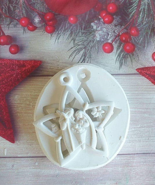 Molde de estrela para presépio com figura do menino Jesus em relevo