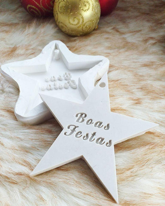 Molde de estrela branco com relevo «Boas Festas» e cavidade central para artesanato
