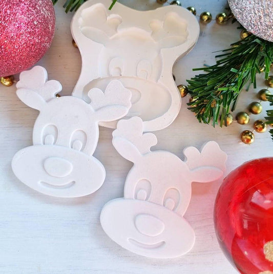 Molde de rena branco com silhuetas em relevo para decoração