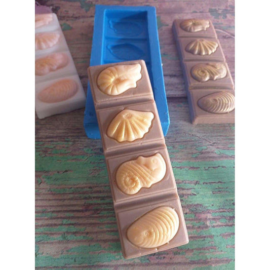 Molde de barra de chocolate azul com 4 cavidades de marisco em relevo
