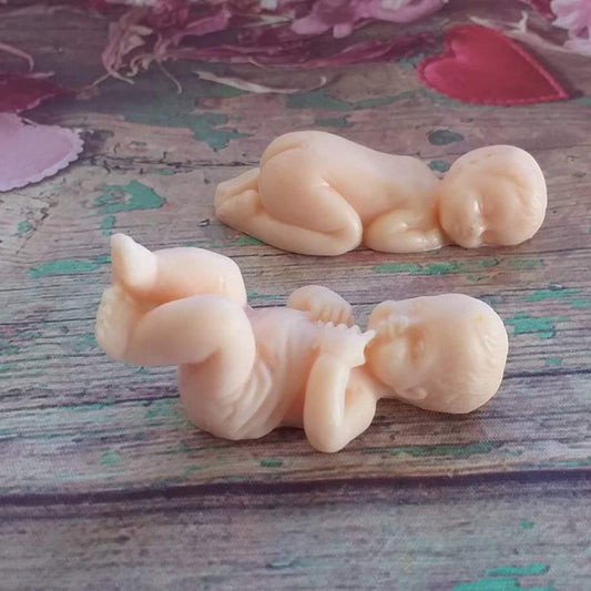 Figuras do Menino Jesus do molde, em creme, duas posições