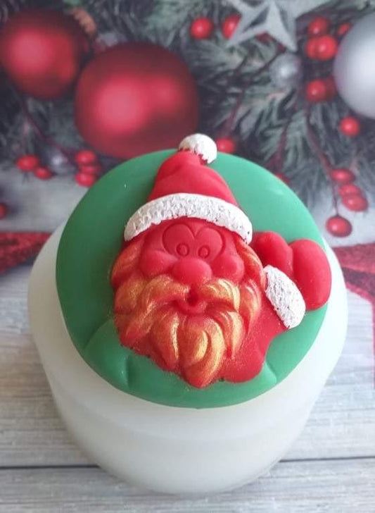 Molde redondo com Pai Natal em relevo vermelho, gorro branco e barba dourada