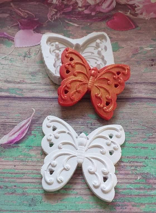Molde de borboleta em silicone branco com borboletas branca e cor de cobre