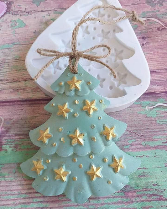 Árvore de Natal azul-esverdeada com furo, cordel e estrelas douradas